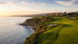 luxury California oceanfront golf resort with cypress trees, photographed in a wide editorial landscape