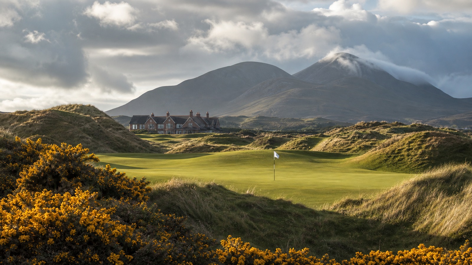 Scenic golf course image representing Royal County Down Course History, Signature Holes, and Famous Moments